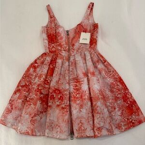 New with tags Alexander McQueen Red Floral Print Flared Dress.